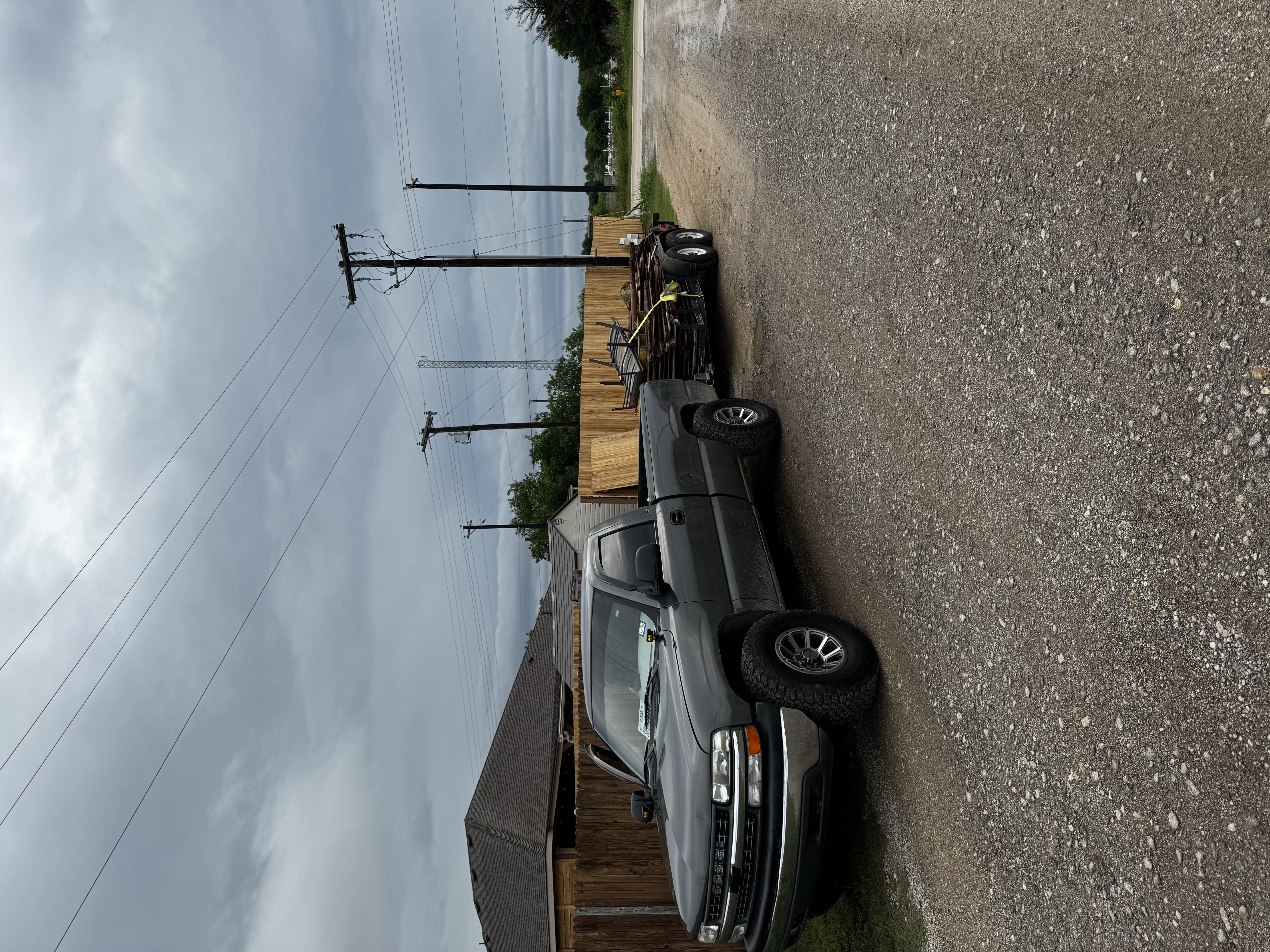 WR Junk Removal trailer loaded with junk on a North Texas job